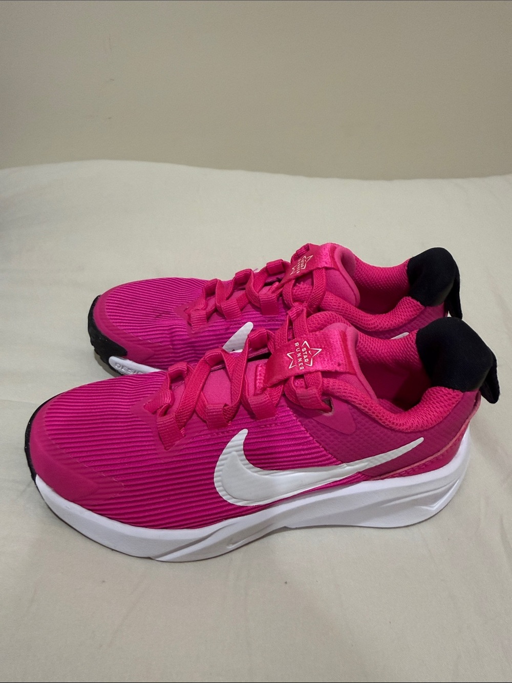 Nike Kids Hot Pink Sneakers with White Swoosh and Black Heel